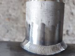 Welded nozzle on a stainless steel spool